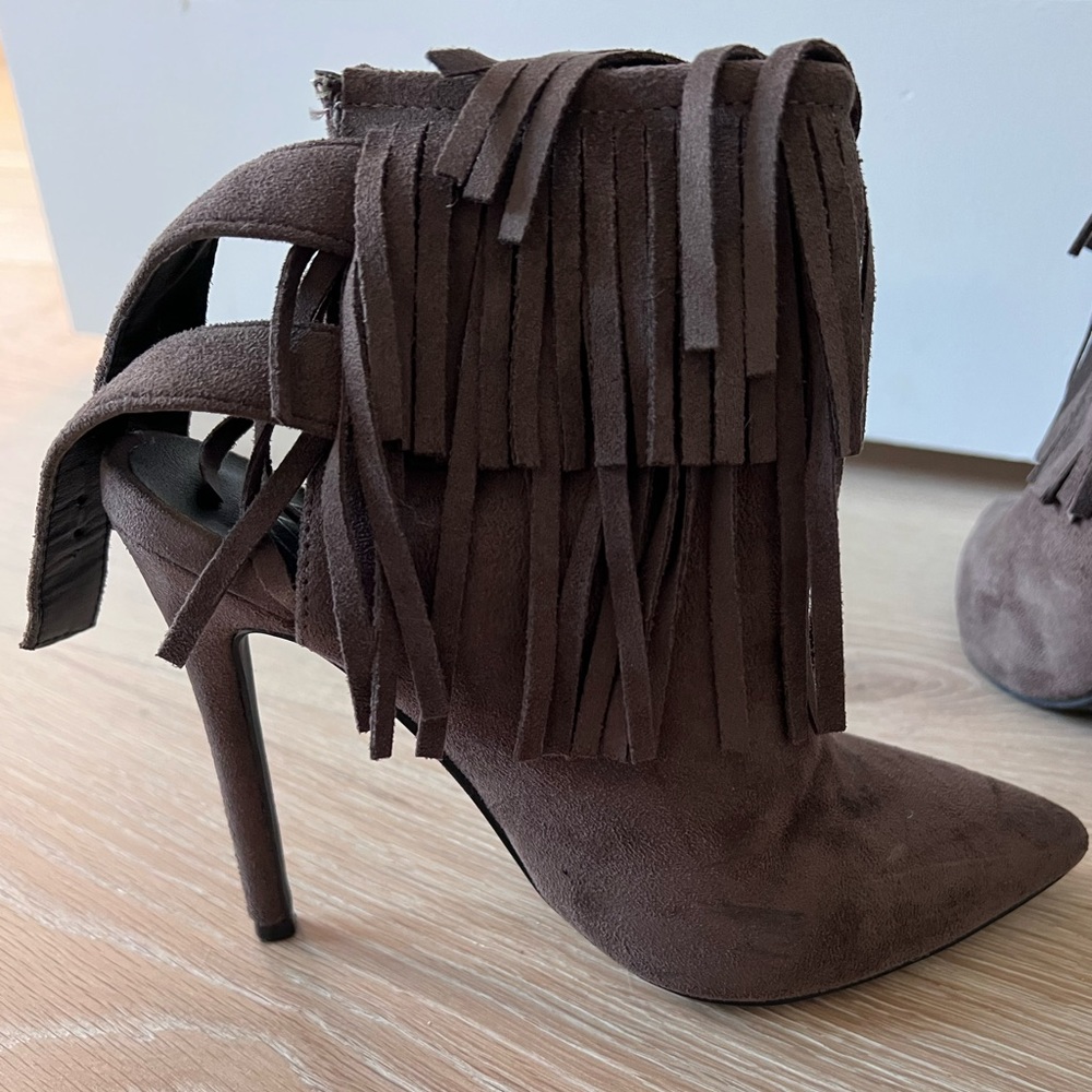 Never worn fringe boots size 6